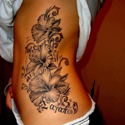 Side body flower tattoo with ink