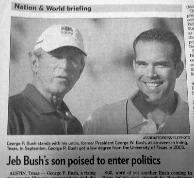 Newspaper clipping wiht photo of George W. Bush with his nephew George P. Bush (son of Jeb Bush), who plans to run for office