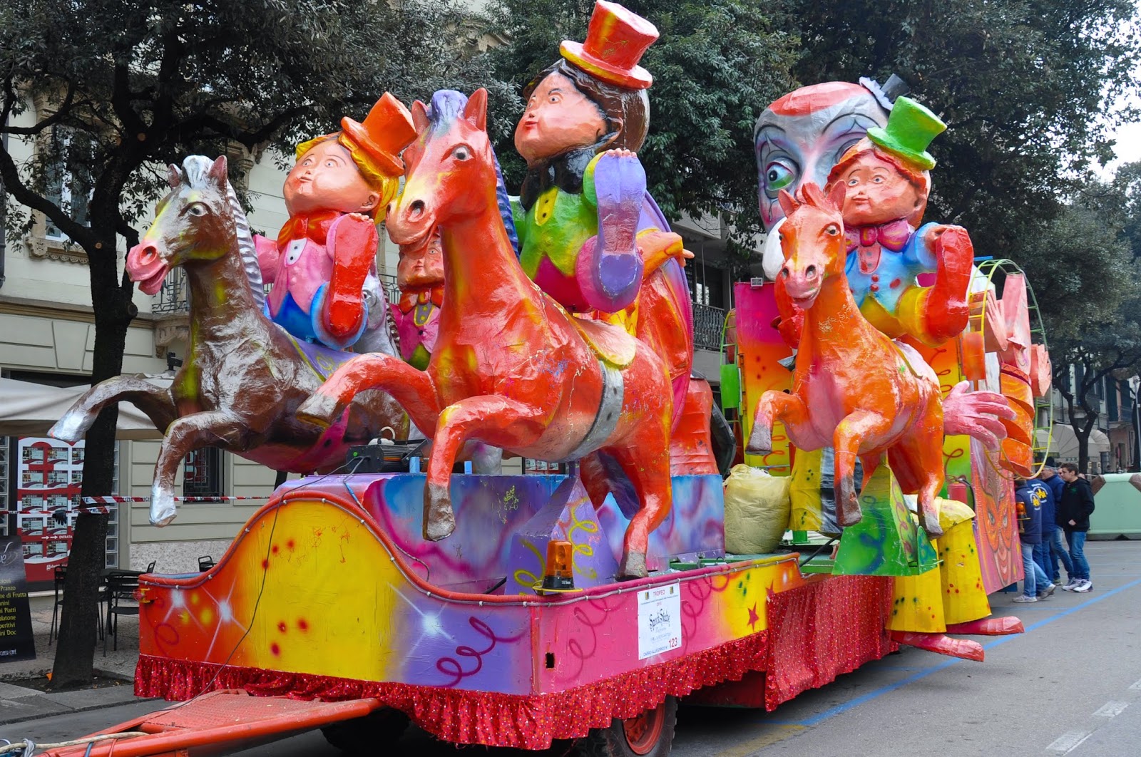 A bright float waiting for the parade for Verona's main Carnival event - Venerdi Gnocolar - to start