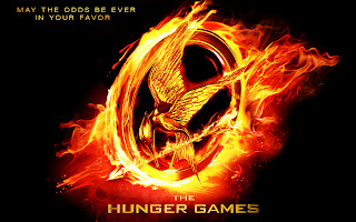 The Hunger Games Flaming Bird with Arrow Logo HD Wallpaper
