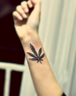 leaf tattoo on the arm