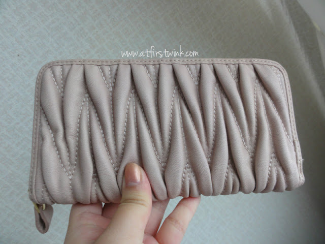 large pale pink rectangular Miu Miu look-a-like wallet