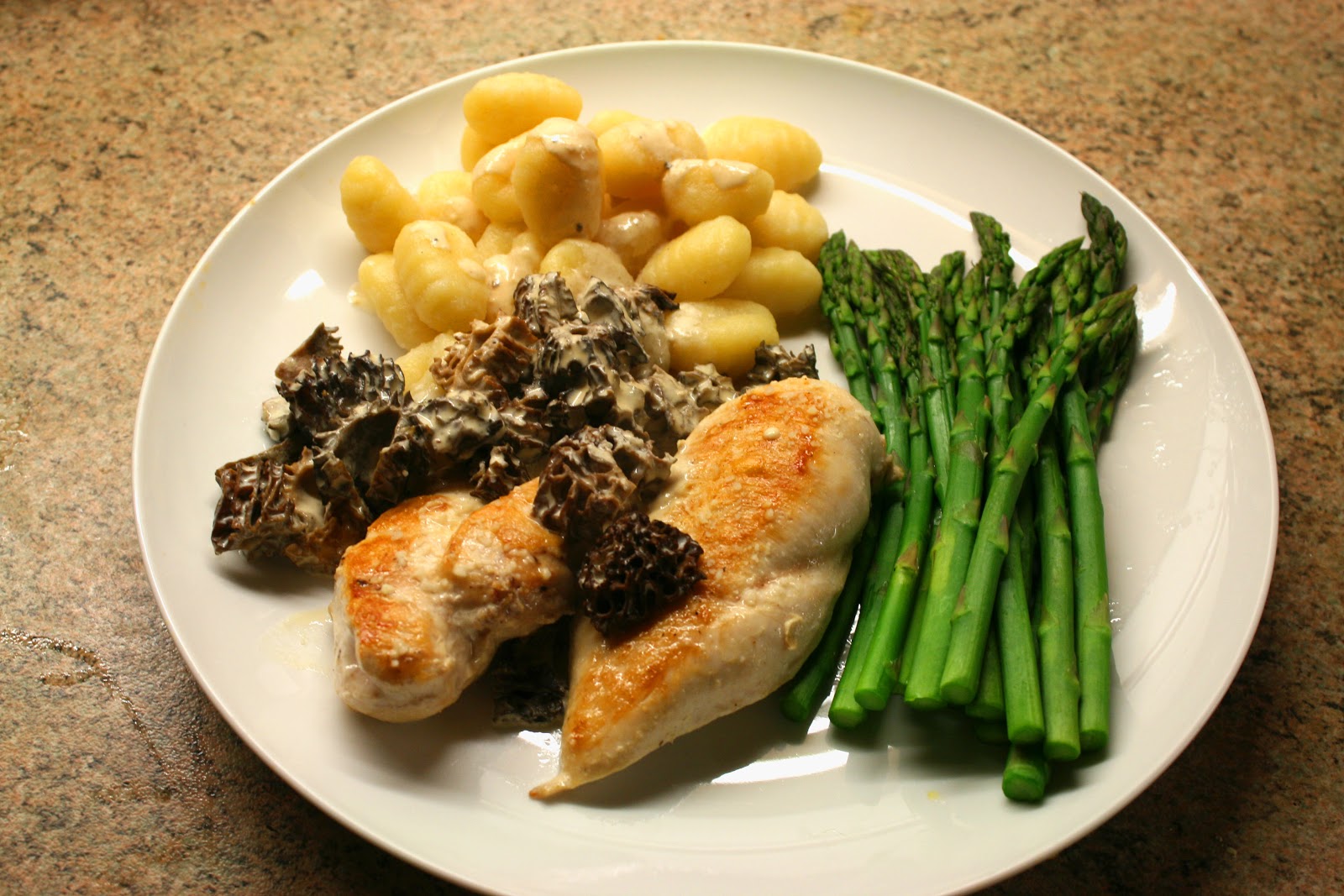 Brunch etc. Chicken breasts with creamy morel mushroom sauce and asparagus