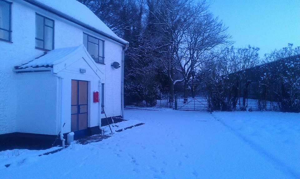 Our Farmhouse in the snow