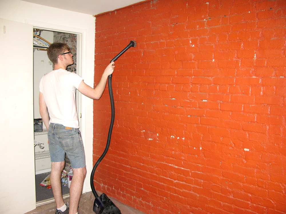 Making Our Brick Basement Apartment a Home Painting the Brick Wall
