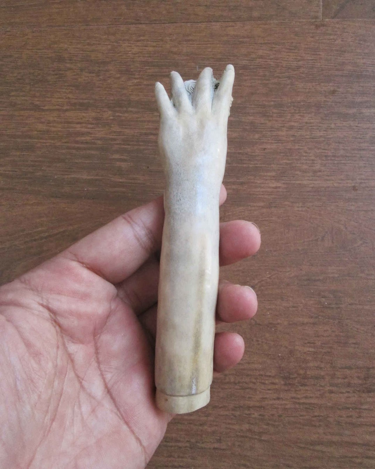Hand Carved Hand Holds Woman Handle in Antler Hand Carved Hand Holds Woman Handle in Antler