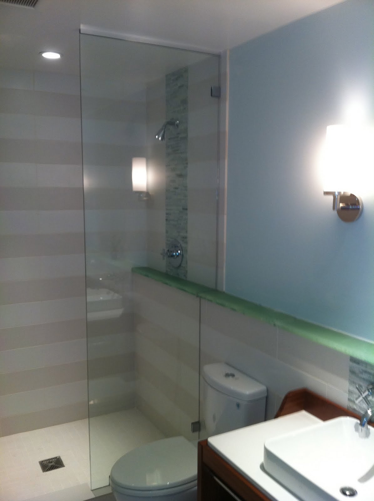Hotel Room Shower Enclosures with KL Megla Hardware • OT Glass