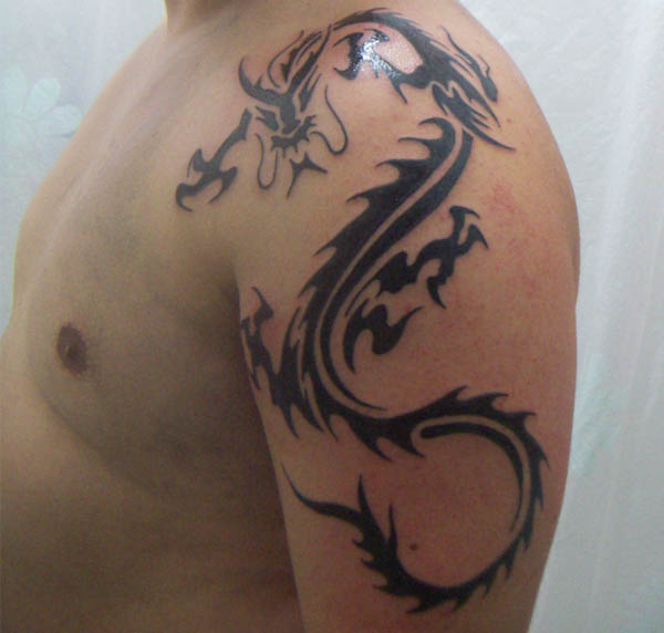 Tribal dragon tattoo shoulder