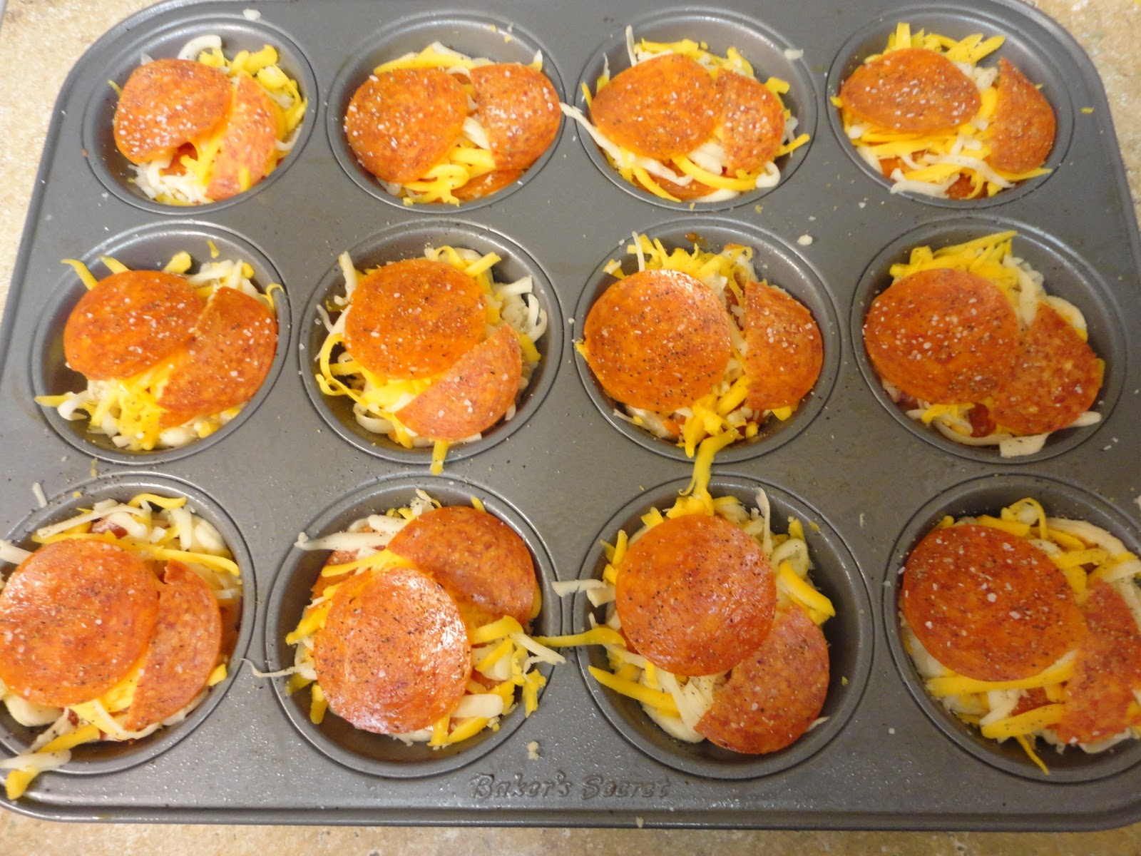 *Riches to Rags* by Dori Muffin Pan Pizza