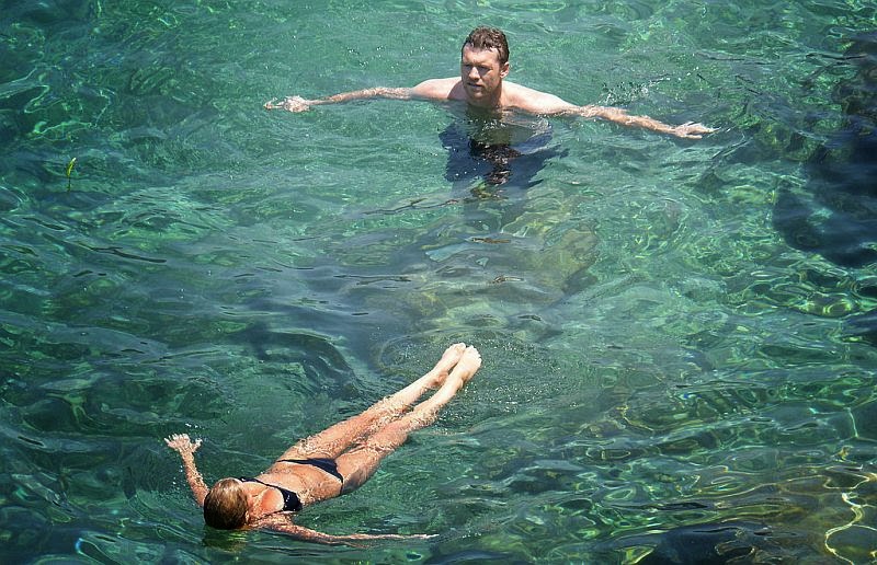 Lara Bingle Does Relax in a Black Bikini on the beach in Italy The ten points have become going to start on Thursday, June 12, 2014. In just a black bikini, the model, Lara Bingle displayed her another great diamond physique in all its glory.