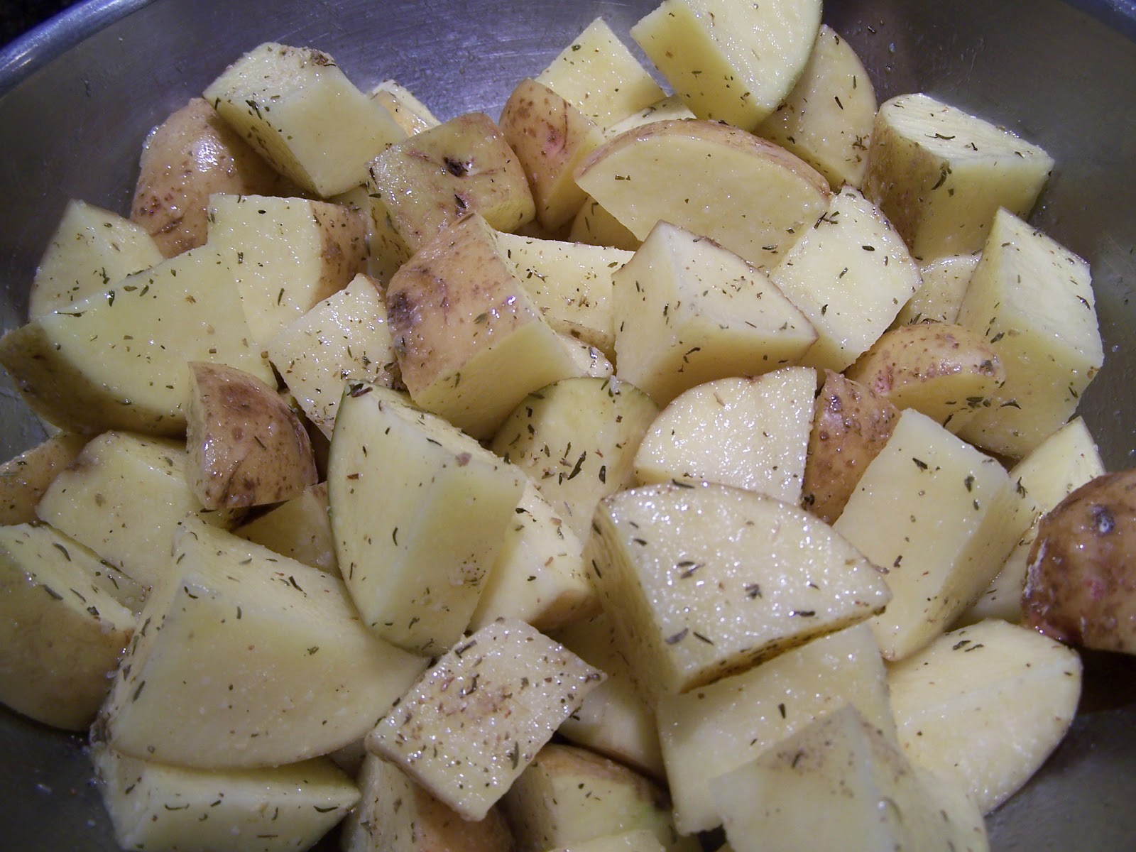 Go Ahead... Take A Bite! Oven Roasted Herbed Potatoes