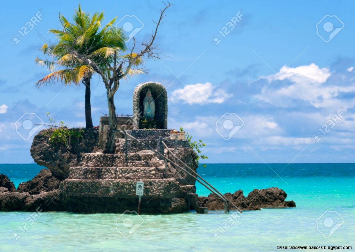 Holy Maria Statue On A Rock In The Sea On Boracay Island Holy Maria Statue On A Rock In The Sea On Boracay Island