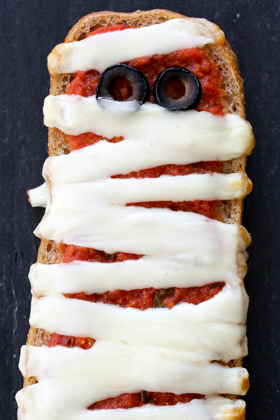 French Bread Pizza Mummies French Bread Pizza Mummies – perfect EASY recipe for your Halloween Party, just 4 ingredients and 15 minutes to make!