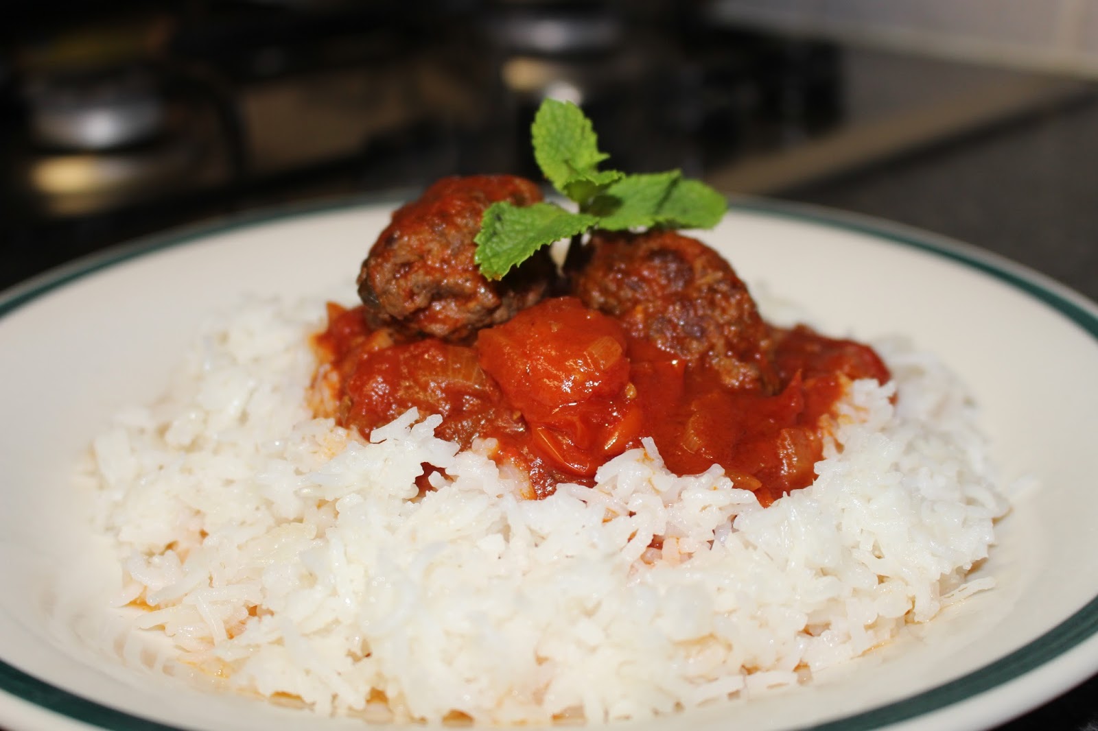 nosaibasfood ) Meat kebabs in tangy tomato sauce