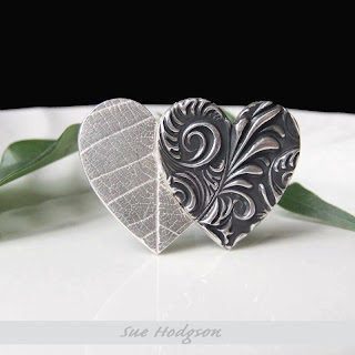 black and silver brooch double heart by sue hodgson