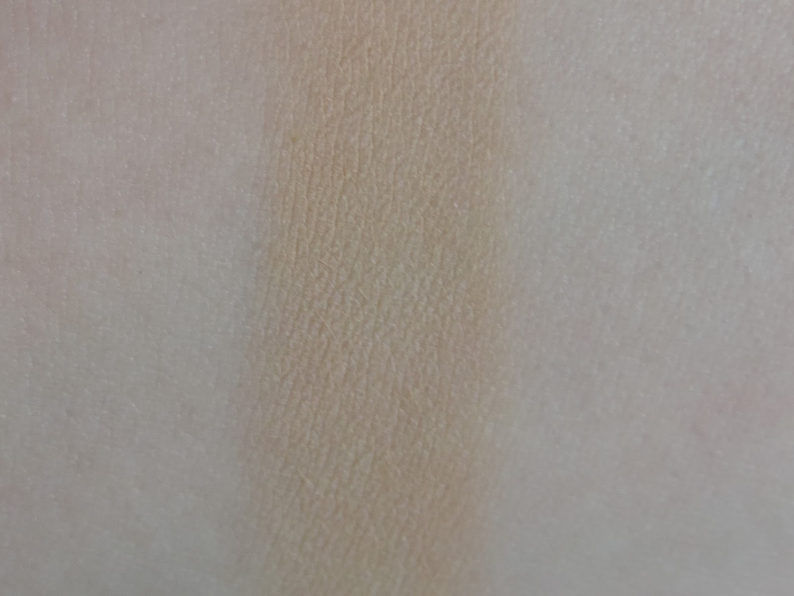 Swatch of Urban Decay Naked Skin Ultra Definition Powder Foundation in Medium Neutral