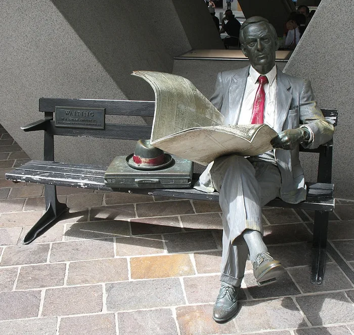 Businessman reading a newspaper