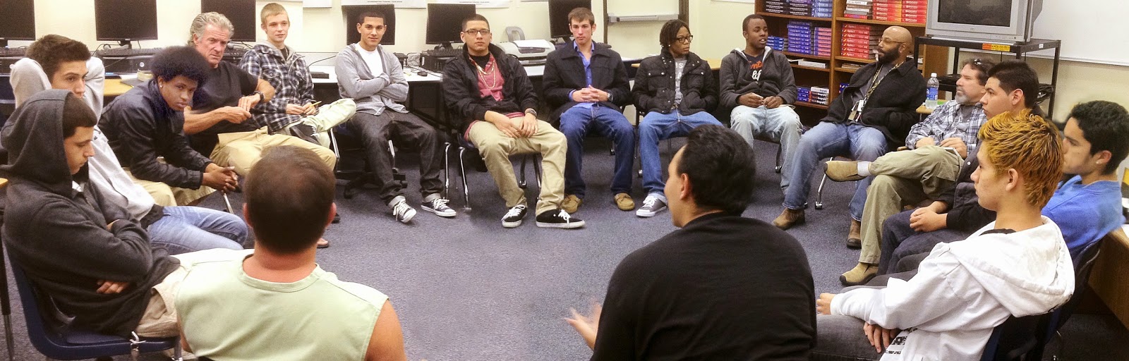 MANMAKING Men and Young Men Sitting in a Circle