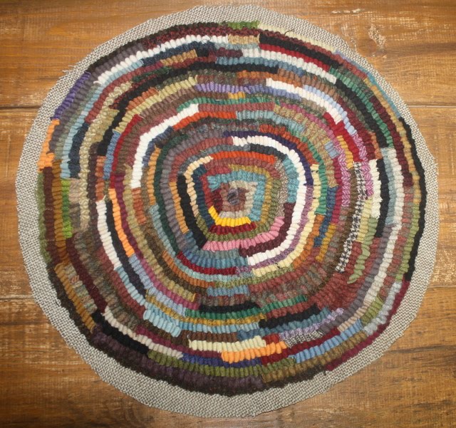Primitives by the light of the moon: Binding a Round Hooked Rug or