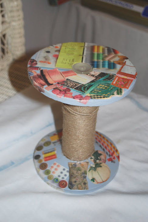 large spool with decoupage sewing images