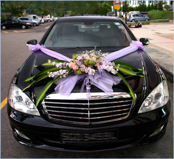 A car decorated wedding not only signifies a new marriage but also shows 