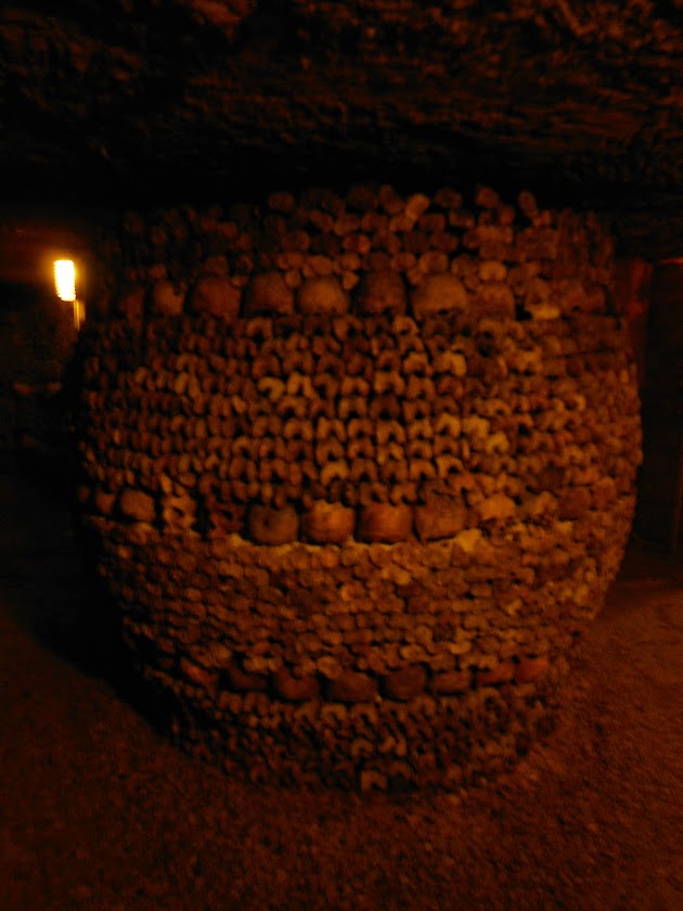 Call it maturity (ugh !) , i visit for the first time 20 years later the official catacombs of Paris  and i love it !!!!  "Catacombs is an underground ossuary in Paris. Located south of the former city gate (the "Barrière d'Enfer" at today's Place Denfert-Rochereau), the ossuary holds the remains of about six million people and fills a renovated section of caverns and tunnels that are the remains of Paris's stone mines."