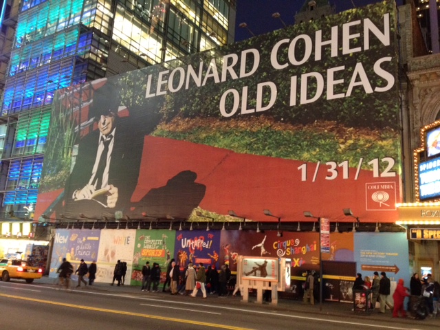  photos of a billboard for Old Ideas at Times Square in New York City