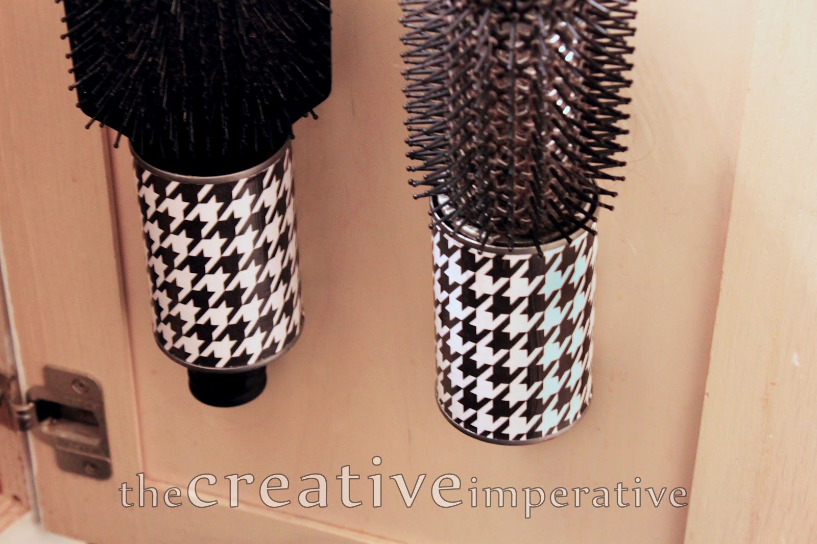 The Creative Imperative Hanging Hairbrush Storage from Tin Cans