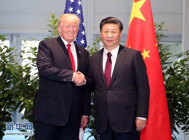 中國國家主席習近平與美國總統川普在G20峰會上握手合照。 中國國家主席習近平與美國總統川普在G20峰會上握手合照。