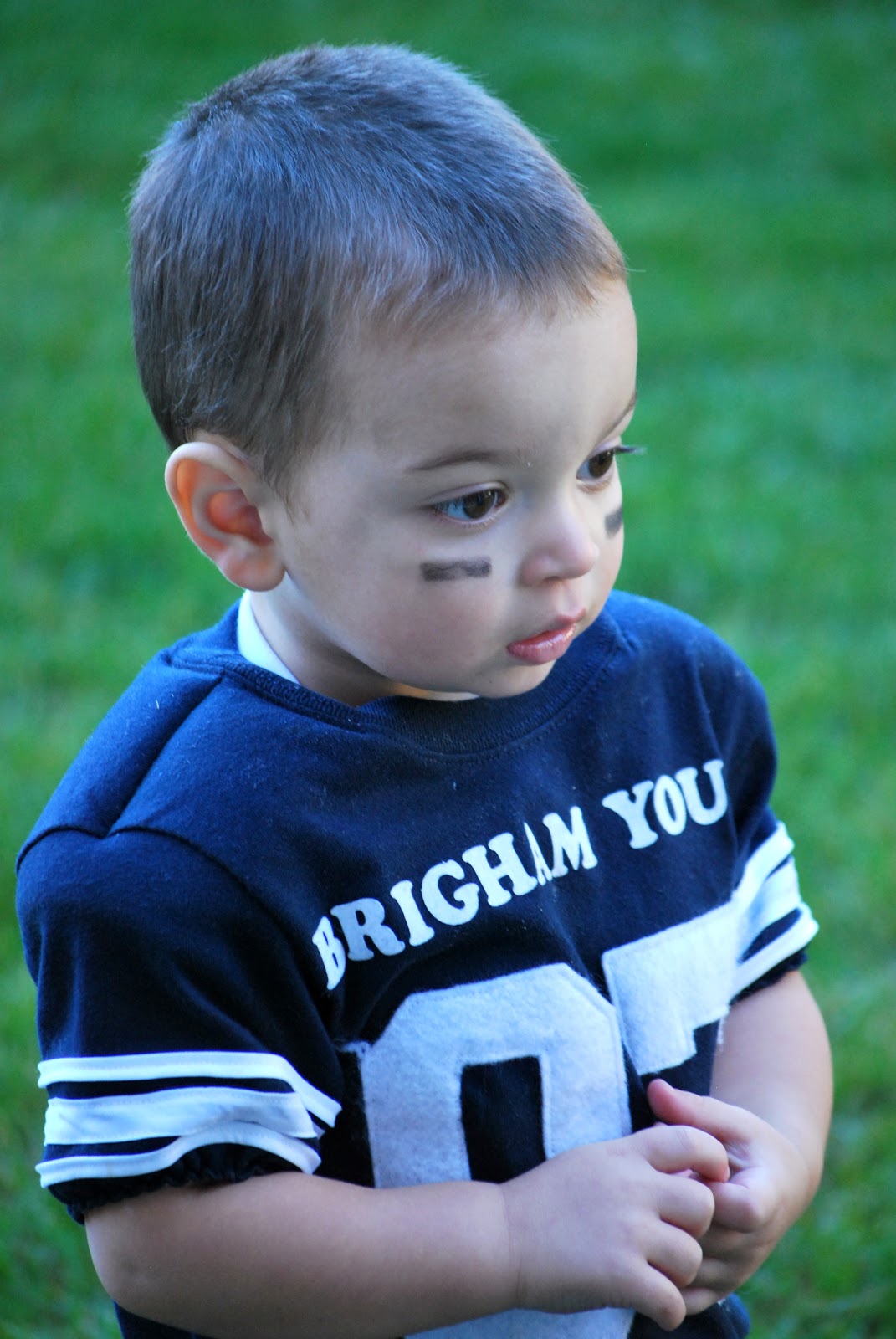 me a chance to take a few pictures of Peanut in his football uniform ...