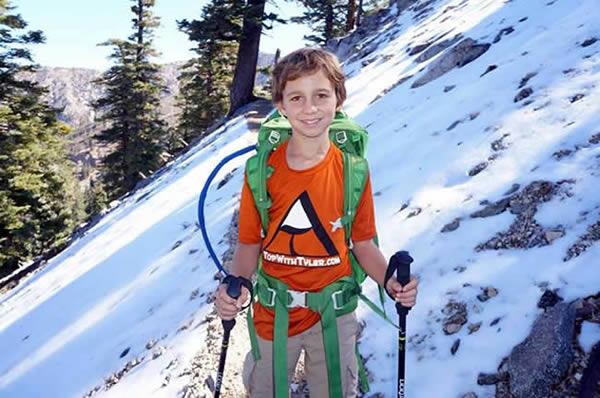 Anak laki-laki umur 9 tahun yang menjadi orang termuda mencapai puncak tertinggi di Belahan Barat