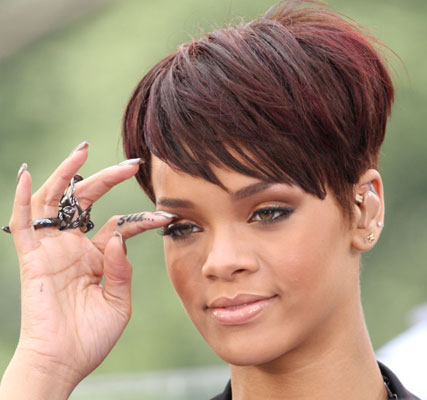Rihanna tattoos the size of a grapefruit on her finger which Hova could 