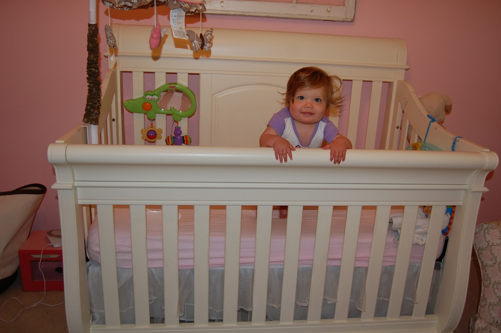 how to lower crib mattress