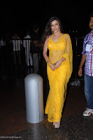 Madhurima latest hot photos stills in transparent yellow
