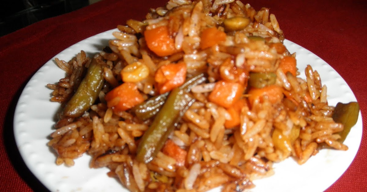 Haitian Creole Preparing Rice with Mixed Vegetables and Anchovies