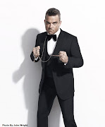 . styling and his intimate black and white close ups of Robbie are .