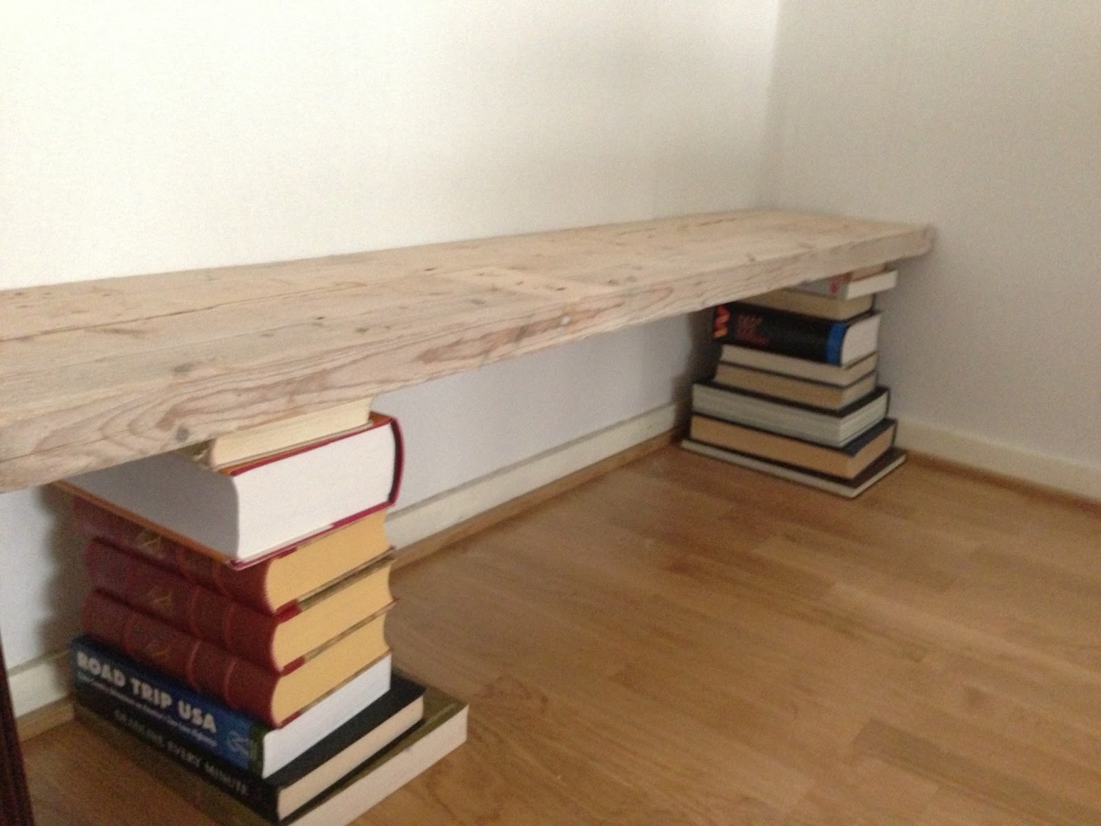 Plank and Bricks A DIY shelf out of salvaged wood and books