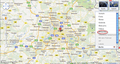 Ein Screenshot zeigt ein Dropdown in Google Maps mit der Auswahl "Wikipedia!