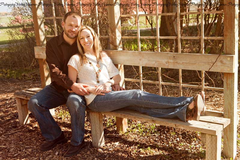 Olmstead State Park Engagements  Jeff and Elisia photo of couple sitting on rustic bench