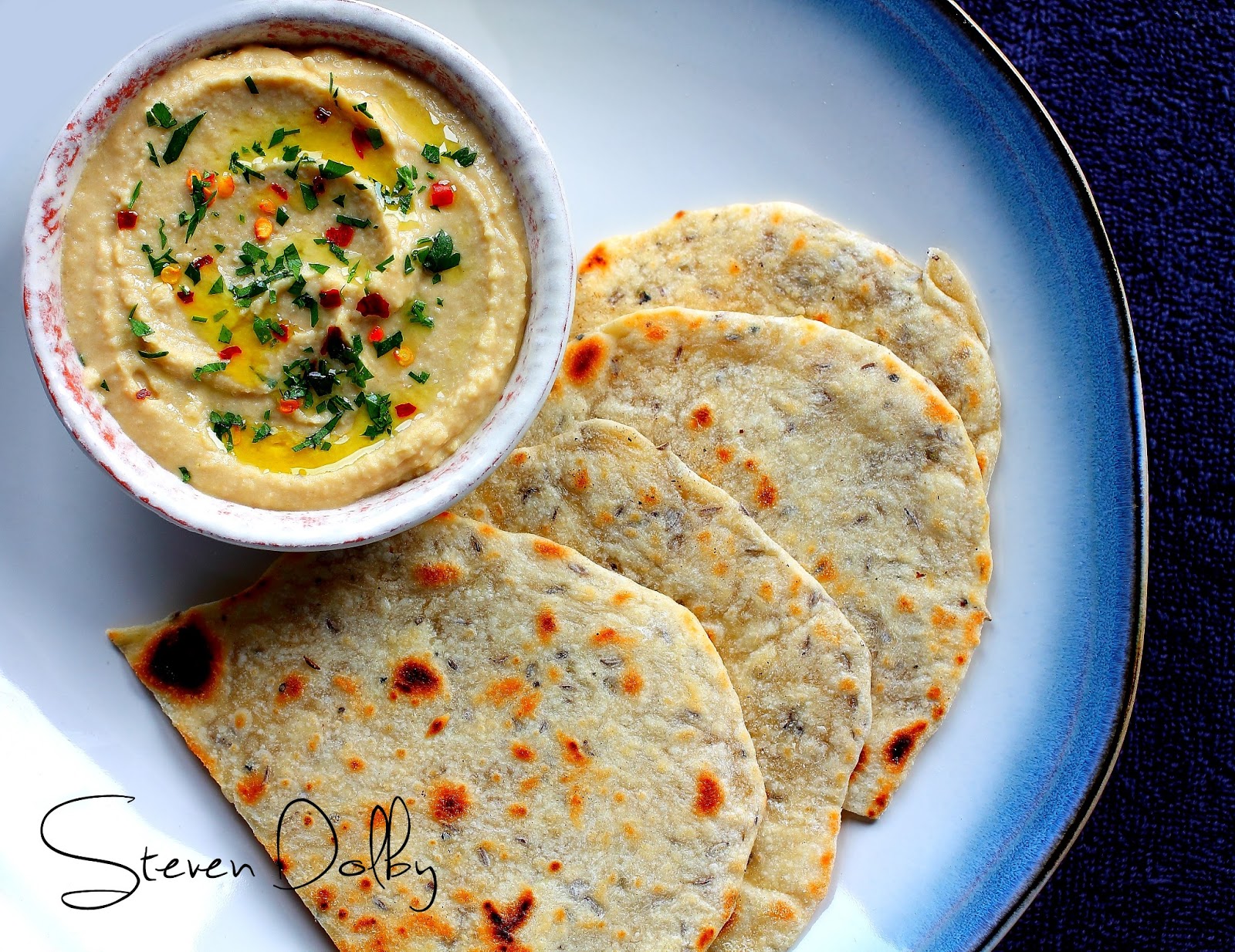 Caraway and Onion flatbread with Hummus by Steven Dolby
