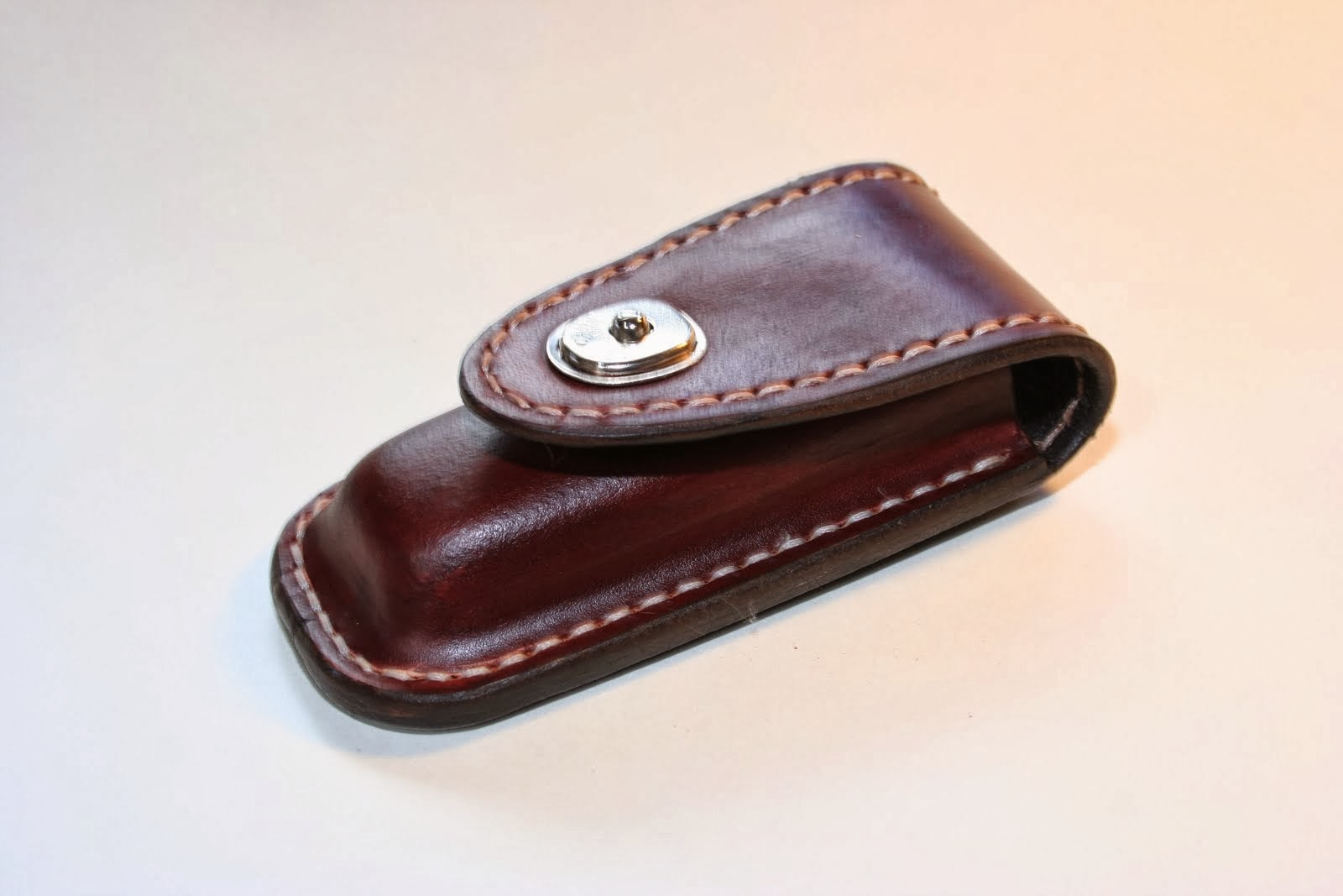 Stitched 'Leatherman' pouch with Lift the dot fastner