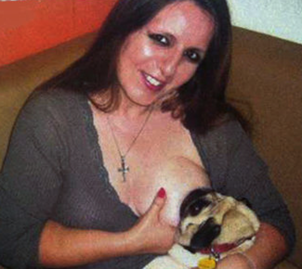 woman_breast_feeds_dog.png