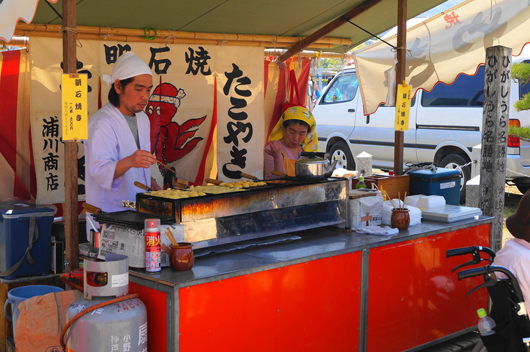 One of the standard food is Takoyaki(octopus dumpling)