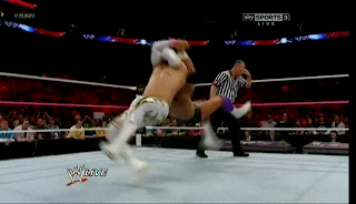 Damien Sandow performs a finisher on Sin Cara