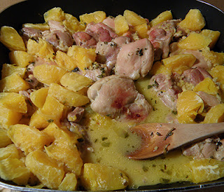 Chicken with Oranges in Frying Pan with Sauce