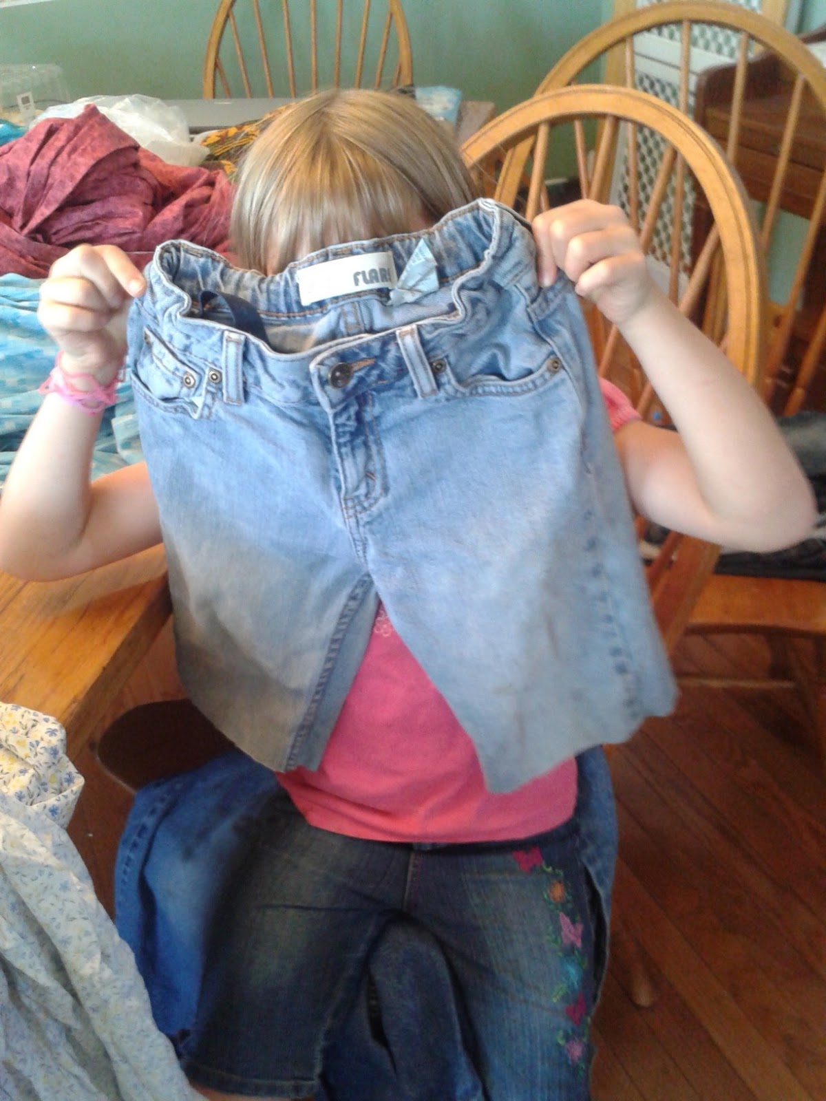 Momma Suz's Ramblings Turn holey jeans into adorable shorts!
