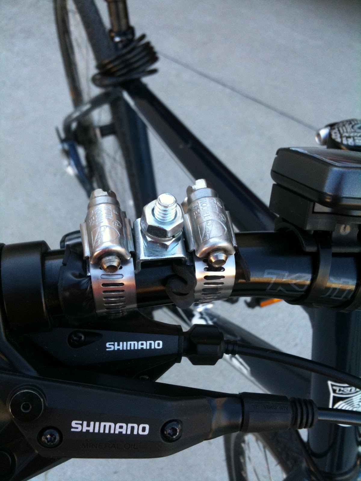 Adventures in Ham Radio OffTopic Mount Flip Camera to Bicycle Handlebars