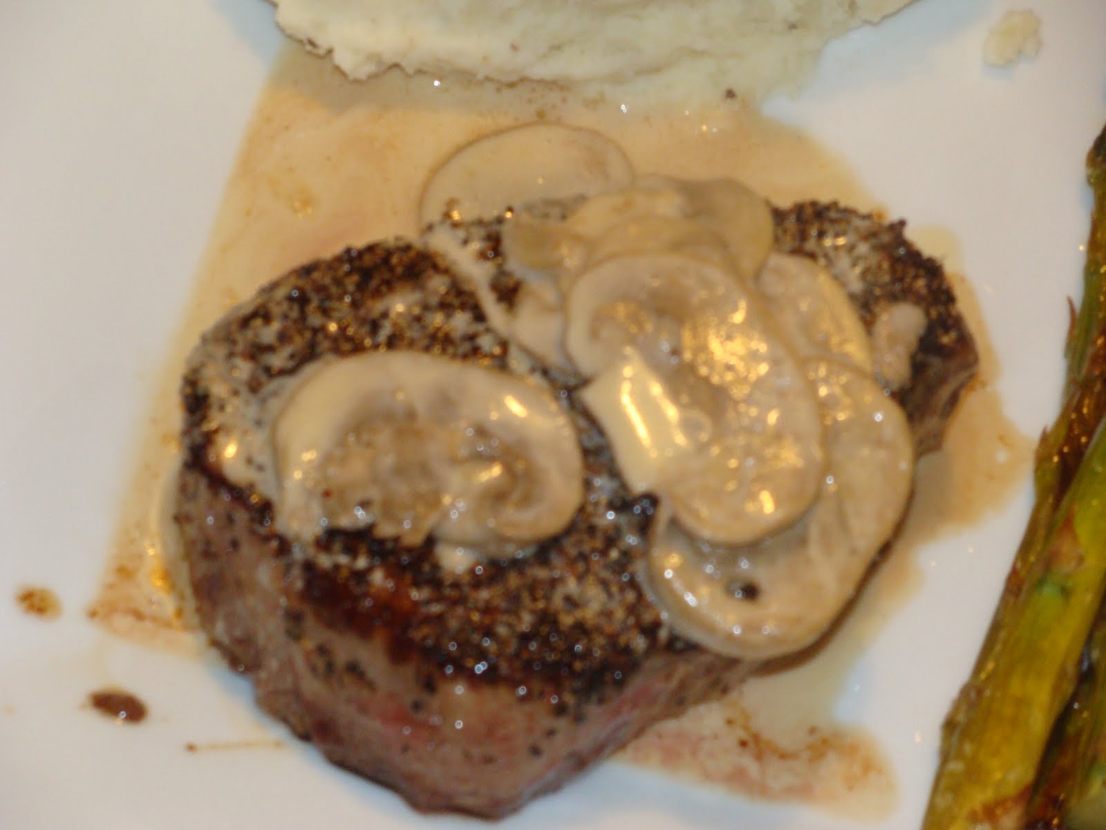 PepperCrusted Tenderloin Steak With A Creamy Mushroom Marsala Sauce