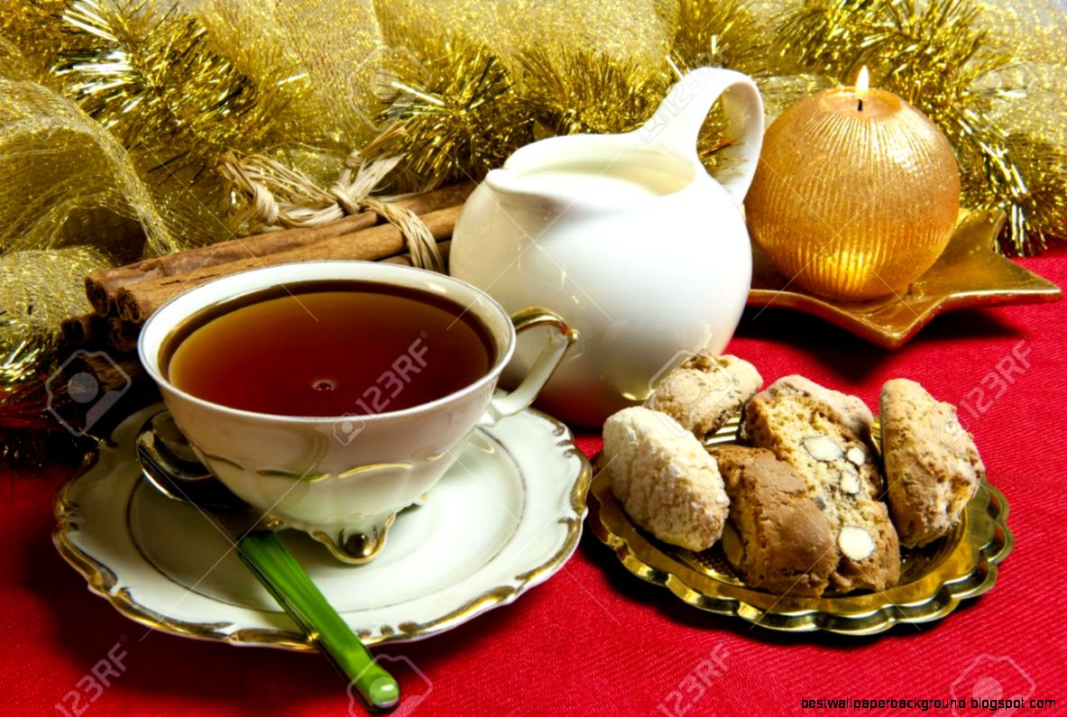 Tea And Cookies With Christmas Decorations On Red Background Stock Tea And Cookies With Christmas Decorations On Red Background Stock