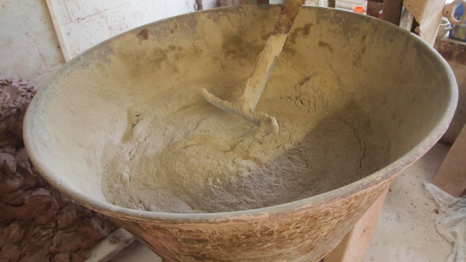 pots and pieces MIxing Clay